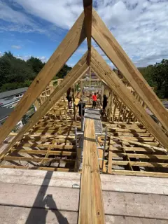 New roof trusses going up over the house