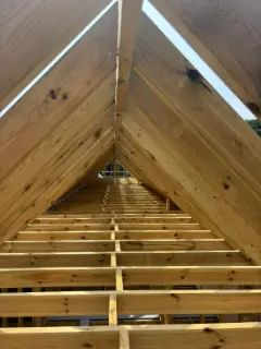 The new rafters and ceiling joists from the ridge