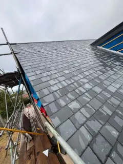 Natural slates laid along the roof
