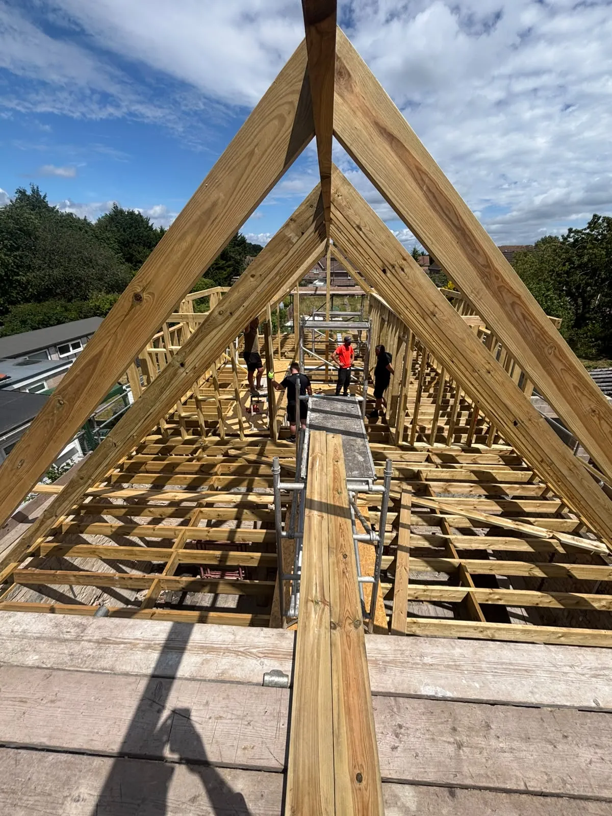 New roof trusses going up over the house
