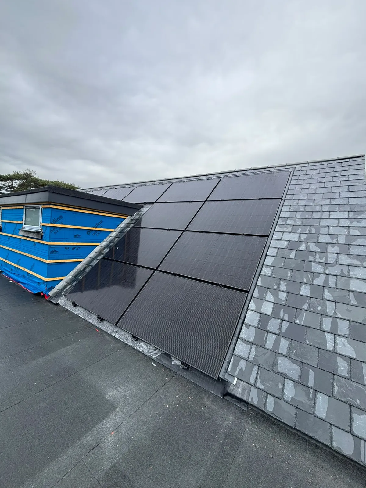 Finished Wallisdown roof: natural slate, solar panels and the new dormer